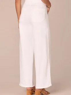 “Ab”solution® Skyrise Tulip Hem Wide Leg Petite Jeans